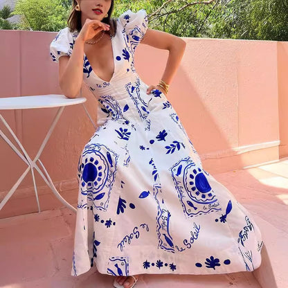 Damen Maxikleid mit voluminösen Puffärmeln und floralen Mustern Stalluxe