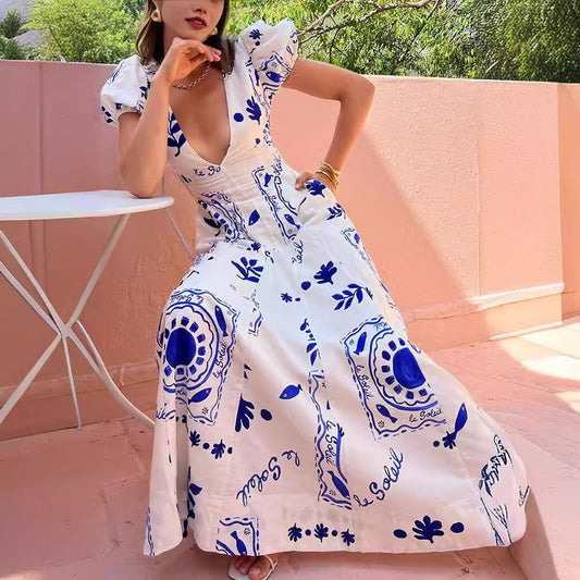Damen Maxikleid mit voluminösen Puffärmeln und floralen Mustern Stalluxe