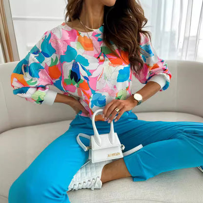Damen lässiges Sweatshirt mit buntem Blumenmuster und überschnittenen Schultern Stalluxe