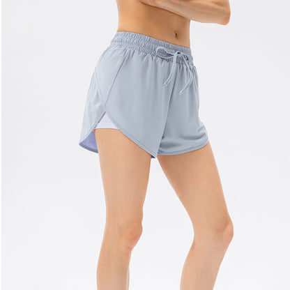 Damen Sportliche Laufshorts mit elastischem Bund und seitlichen Schlitzen Stalluxe
