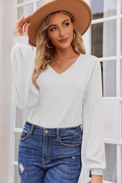 Damen Strickbluse mit feiner Rippstruktur und lässigem V-Ausschnitt Stalluxe