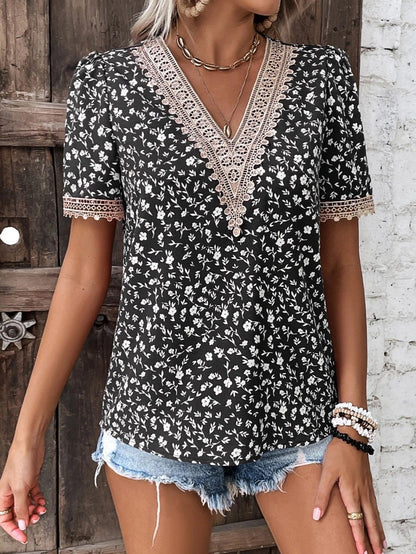 Damen Lockere Bluse mit floralem Muster und Spitzenverzierungen Stalluxe