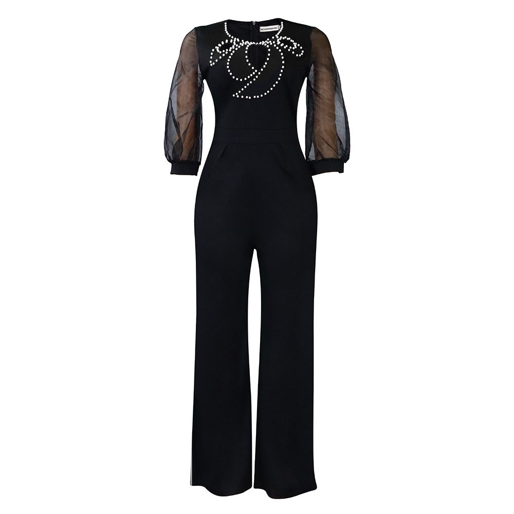 Damen eleganter Jumpsuit mit transparenten Ärmeln und Perlenverzierung Stalluxe