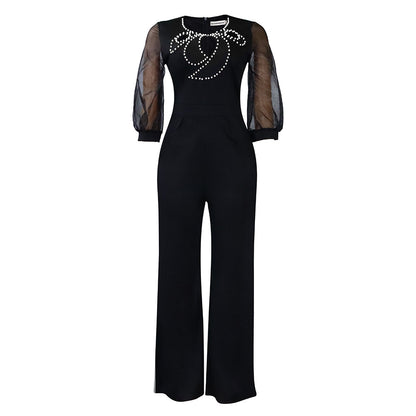 Damen eleganter Jumpsuit mit transparenten Ärmeln und Perlenverzierung Stalluxe