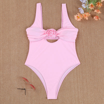 Damen Eleganter Einteiler Badeanzug mit floralem Akzent und tiefem Rückenausschnitt Stalluxe