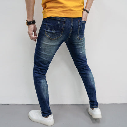 Herren Skinny Fit Jeans mit kreativen Farbklecksen und Rissdesign Stalluxe