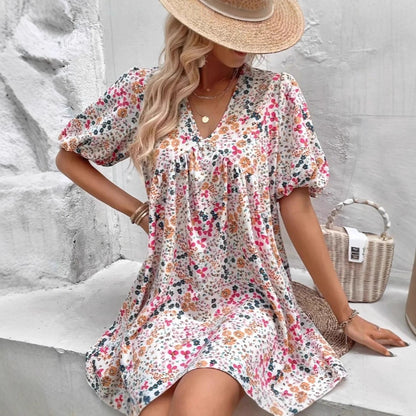 Damen Verspieltes Blümchenkleid mit Puffärmeln und V-Ausschnitt Stalluxe