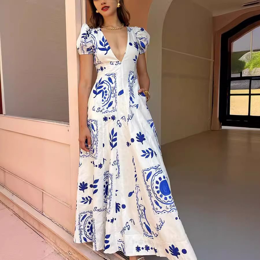 Damen Maxikleid mit voluminösen Puffärmeln und floralen Mustern Stalluxe