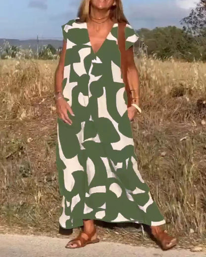 Damen lässiges Maxikleid mit kreativem Muster und tiefem V-Ausschnitt Stalluxe