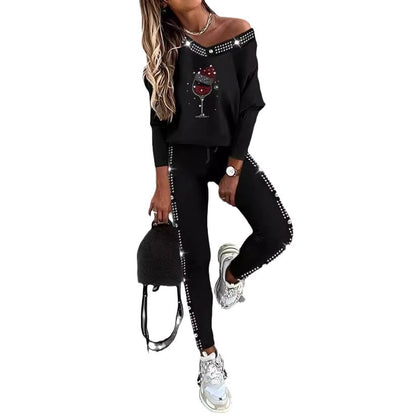 Damen Freizeit Set mit glitzerndem Motiv und offenem Schulterdesign Stalluxe