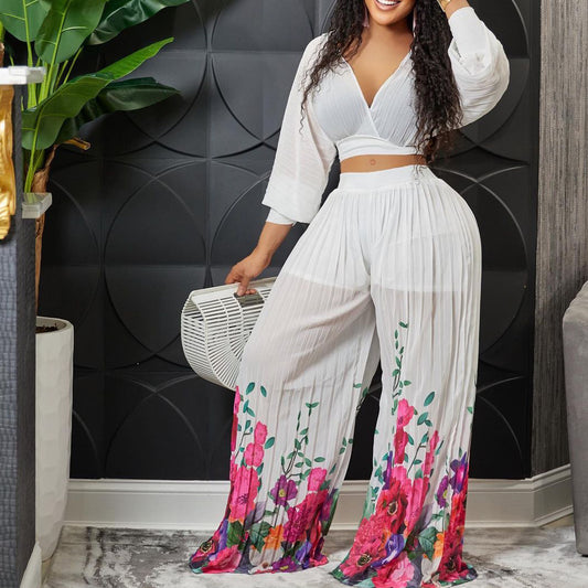 Damen Plissee Jumpsuit mit floralem Print und weitem Bein Stalluxe