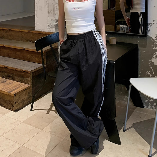 Damen lockere Sporthose mit praktischen Seitentaschen und dekorativen Streifen Stalluxe