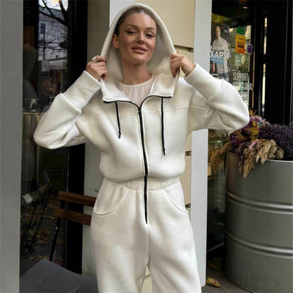 Damen Fleece-Jumpsuit mit Kapuze und praktischen Taschen Stalluxe