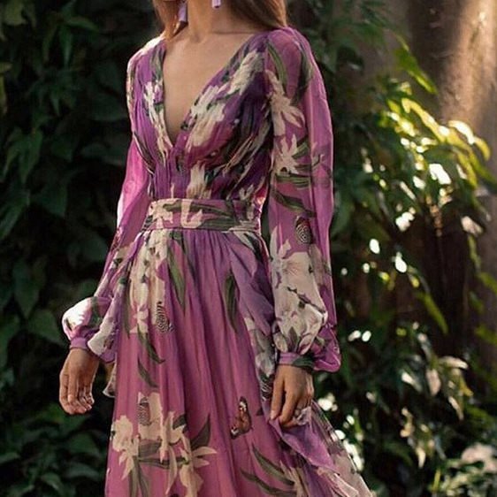 Damen Maxikleid mit tiefem V-Ausschnitt, floralem Design und schwingendem Rock Stalluxe