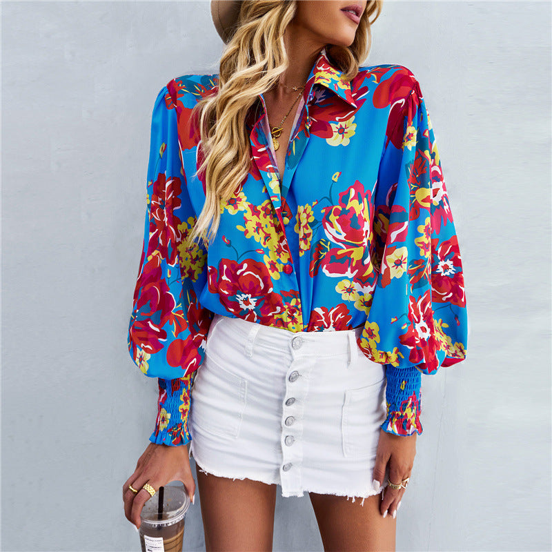 Damen Bluse mit voluminösen Ärmeln und buntem Blumendesign Stalluxe