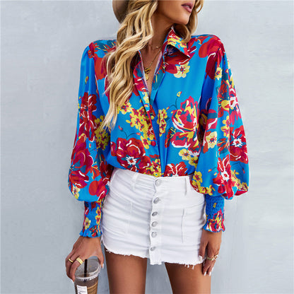 Damen Bluse mit voluminösen Ärmeln und buntem Blumendesign Stalluxe