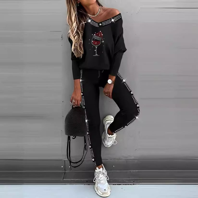Damen Freizeit Set mit glitzerndem Motiv und offenem Schulterdesign Stalluxe