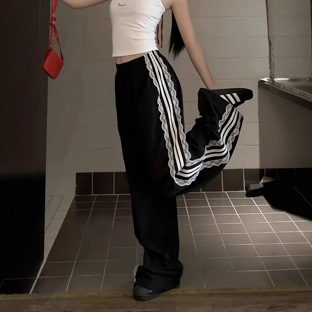 Damen lockere Sporthose mit praktischen Seitentaschen und dekorativen Streifen Stalluxe