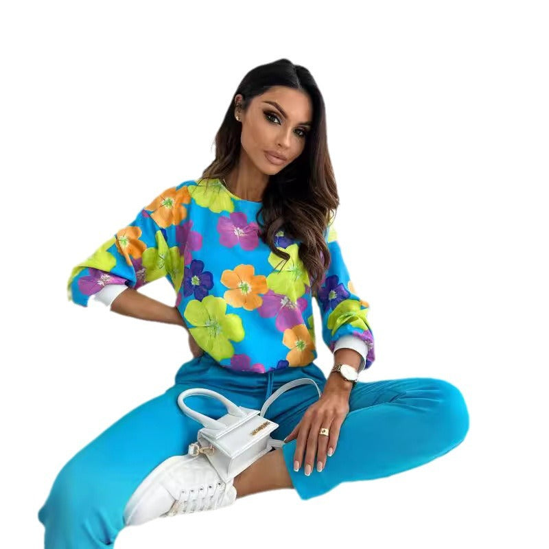 Damen lässiges Sweatshirt mit buntem Blumenmuster und überschnittenen Schultern Stalluxe
