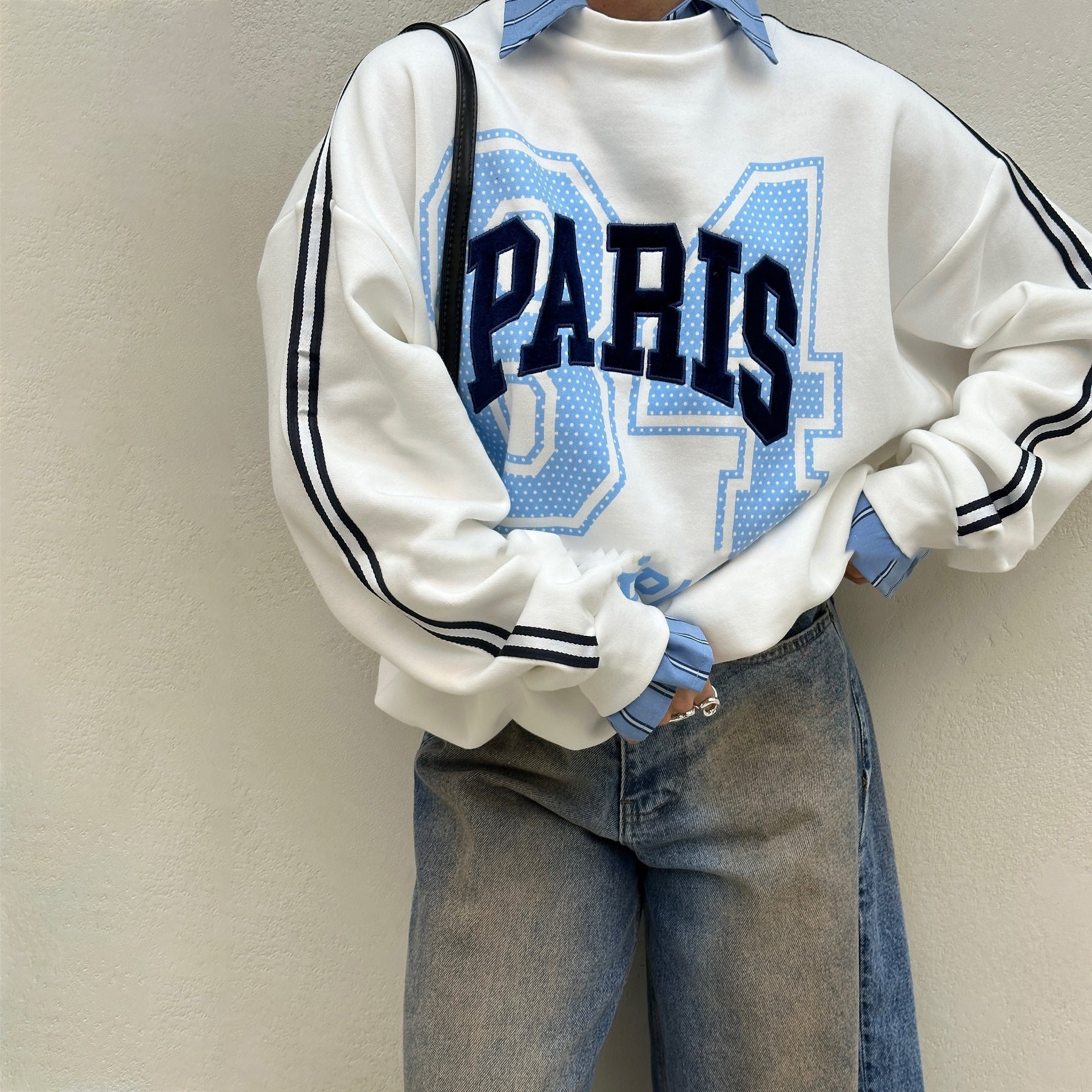 Damen Oversized Sweatshirt mit modischem Paris-Print und gestreiften Akzenten Stalluxe