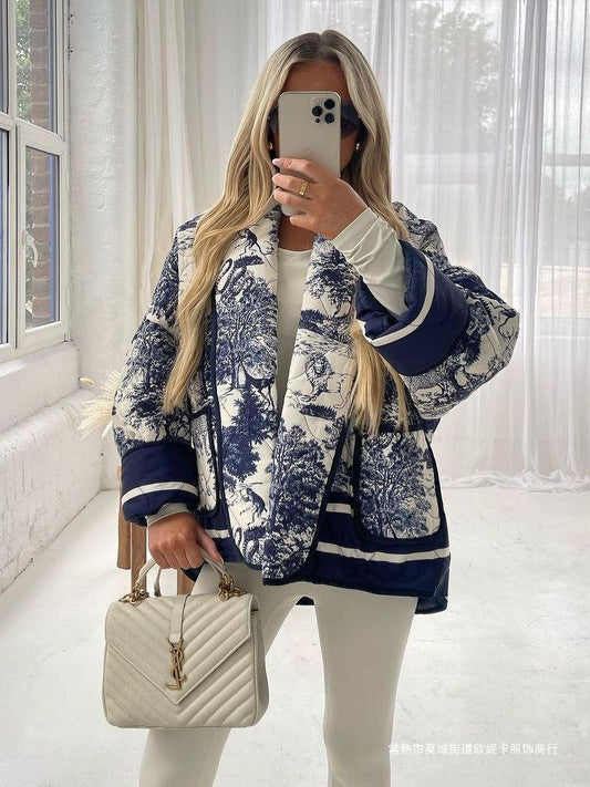 Damen Oversized Steppjacke mit floralem Muster und kontrastierenden Details Stalluxe
