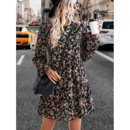 Damen Freizeitkleid mit voluminösen Ärmeln und verspielt-floralen Akzenten Stalluxe