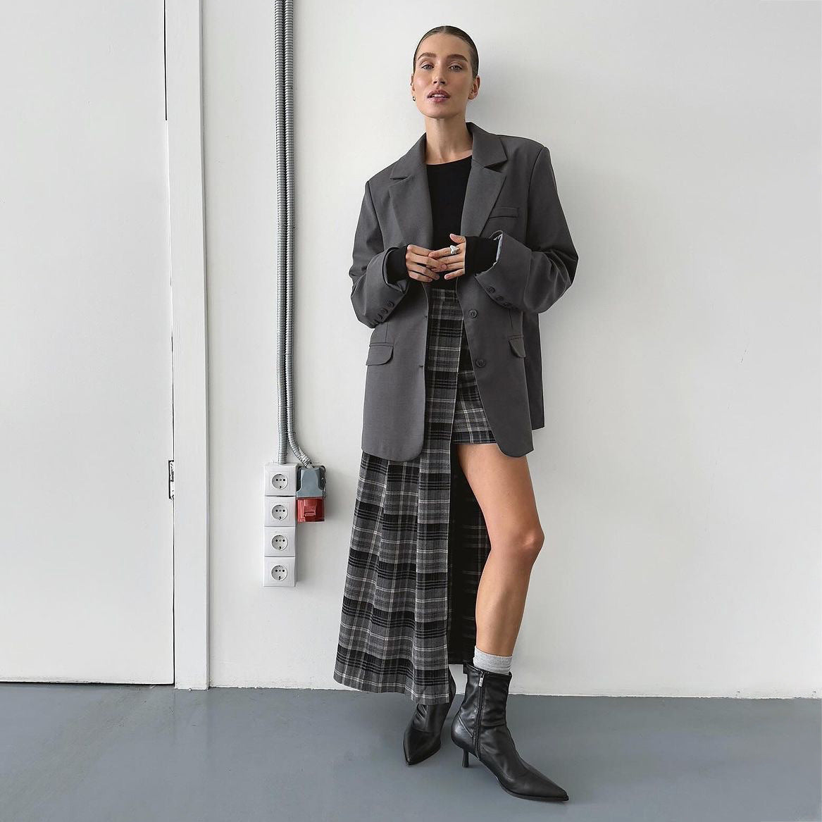Damen Blazer-Rock-Kombination mit asymmetrischem Schnitt und grafischem Karomuster Stalluxe