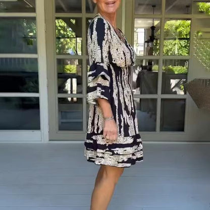 Damen Wickelkleid mit voluminösen Ärmeln und dekorativem Muster Stalluxe