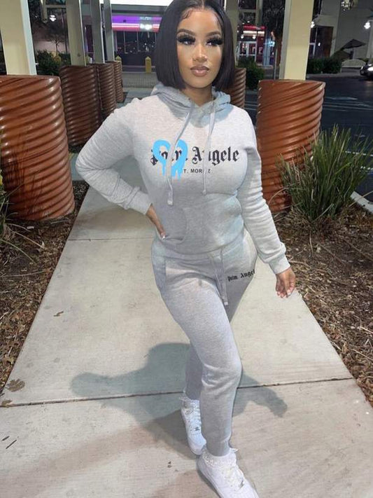 Damen lässiges Hoodie und Jogginghose Set mit kreativem Grafikdesign Stalluxe