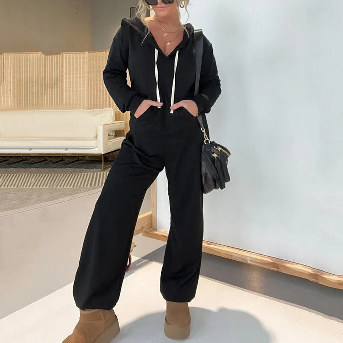 Damen bequemer Hoodie-Jumpsuit mit tiefem V-Ausschnitt und Kordelzug Stalluxe