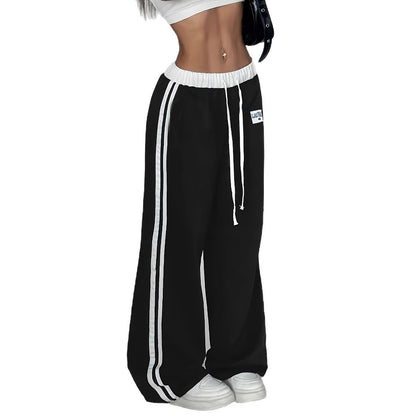 Damen Sportliche weit geschnittene Freizeithose mit elastischem Bund und seitlichen Streifen Stalluxe