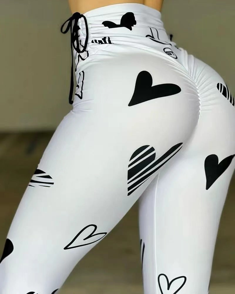 Damen Hochbund-Leggings mit grafischem Herzmuster und hochelastischem Material Stalluxe
