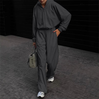 Damen Lässiger Fleece-Jumpsuit mit Kapuze und praktischen Taschen Stalluxe