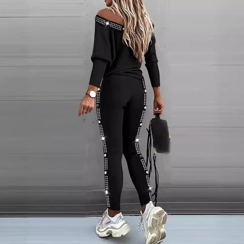 Damen Freizeit Set mit glitzerndem Motiv und offenem Schulterdesign Stalluxe