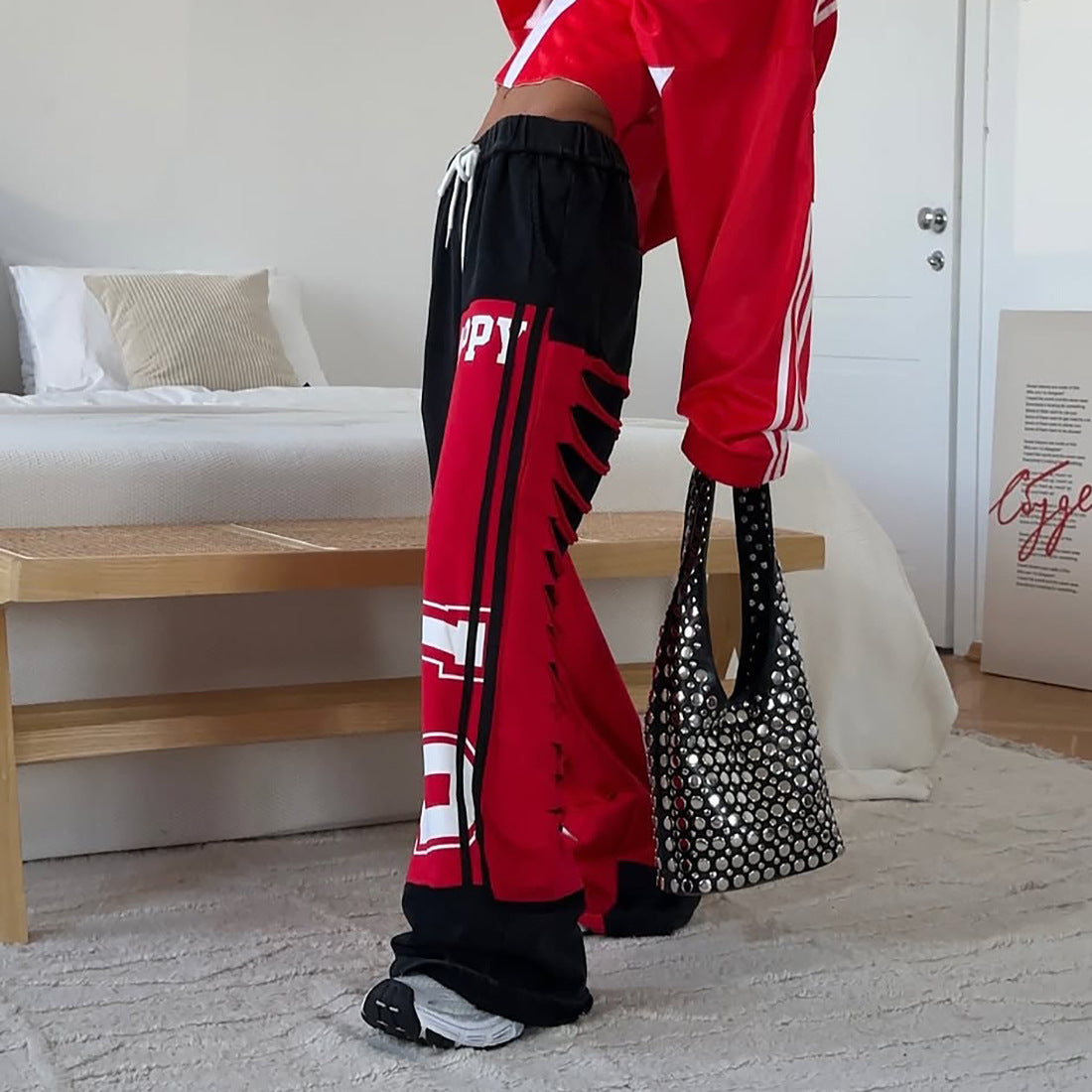 Damen Sportliche Baggy-Hose mit kreativen Cut-Outs und lässigem Stil Stalluxe