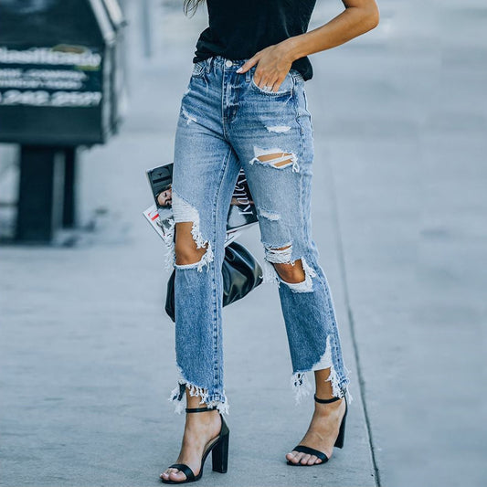 Damen high-waisted Jeans mit fransigen Details und modischen Rissen Stalluxe
