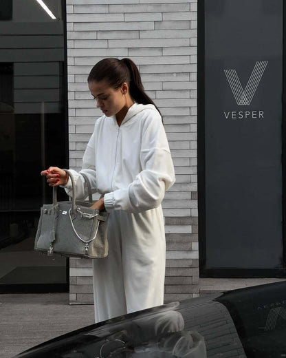 Damen Lässiger Fleece-Jumpsuit mit Kapuze und praktischen Taschen Stalluxe