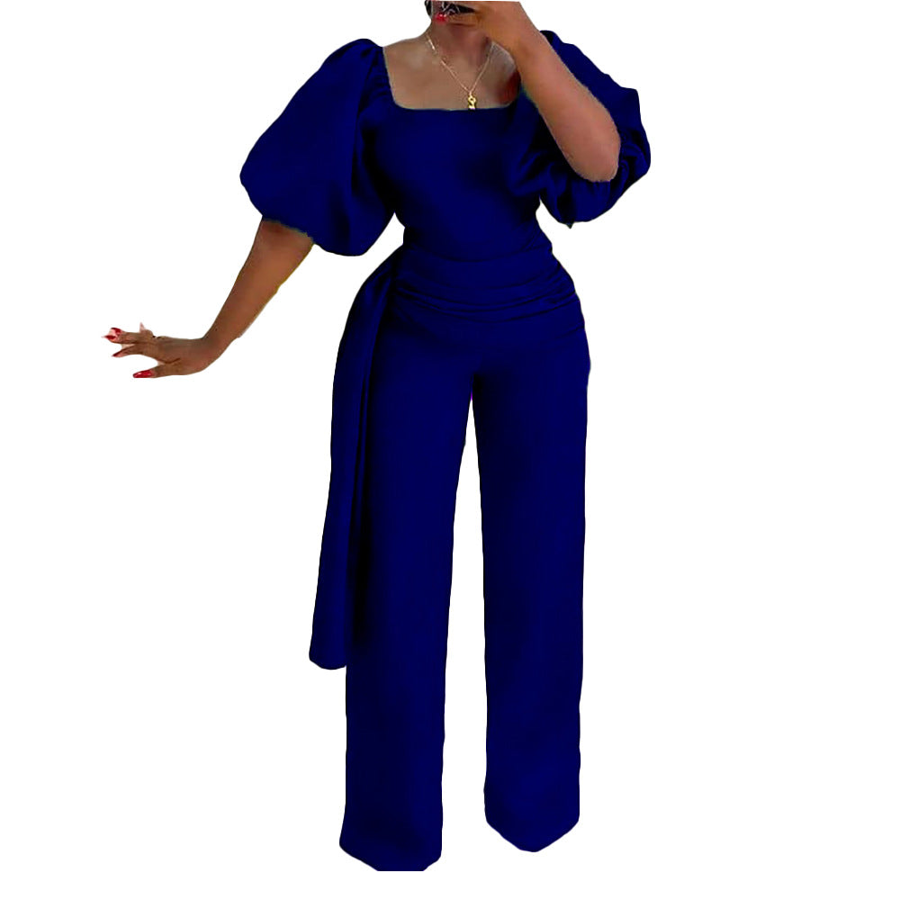 Damen eleganter Jumpsuit mit tailliertem Schnitt und voluminösen Puffärmeln Stalluxe