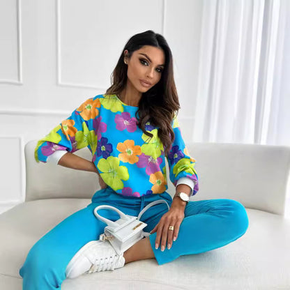 Damen lässiges Sweatshirt mit buntem Blumenmuster und überschnittenen Schultern Stalluxe