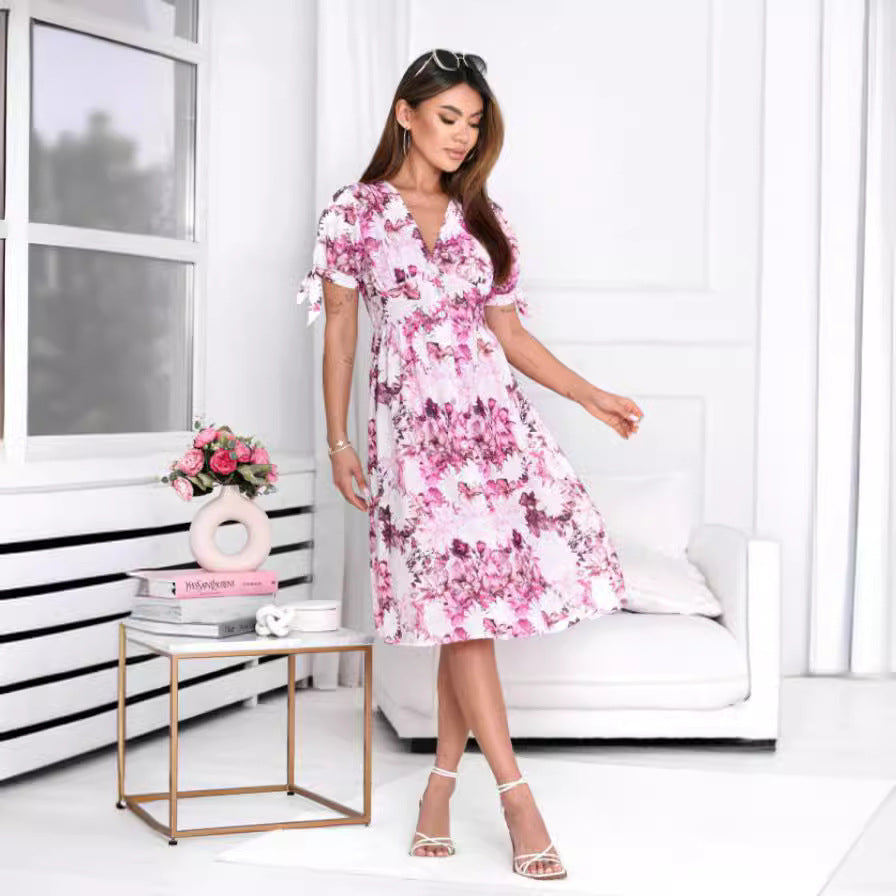 Damen Wickelkleid mit elegantem floralem Muster und asymmetrischem Saum Stalluxe