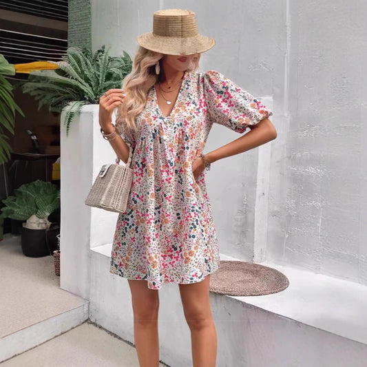 Damen Verspieltes Blümchenkleid mit Puffärmeln und V-Ausschnitt Stalluxe