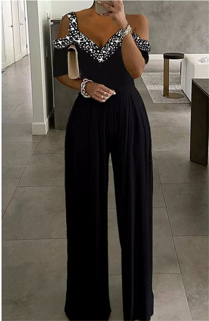 Damen eleganter Jumpsuit mit schulterfreier Gestaltung und glitzerndem Dekolleté Stalluxe