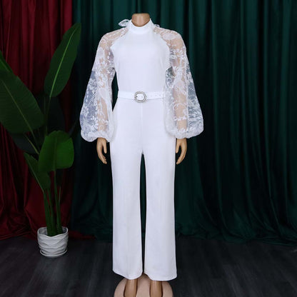 Damen Eleganter Jumpsuit mit transparenten Puffärmeln und tailliertem Gürtel Stalluxe