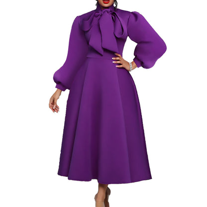 Damen Maxikleid mit voluminösen Ärmeln und eleganten Schleifendetails Stalluxe