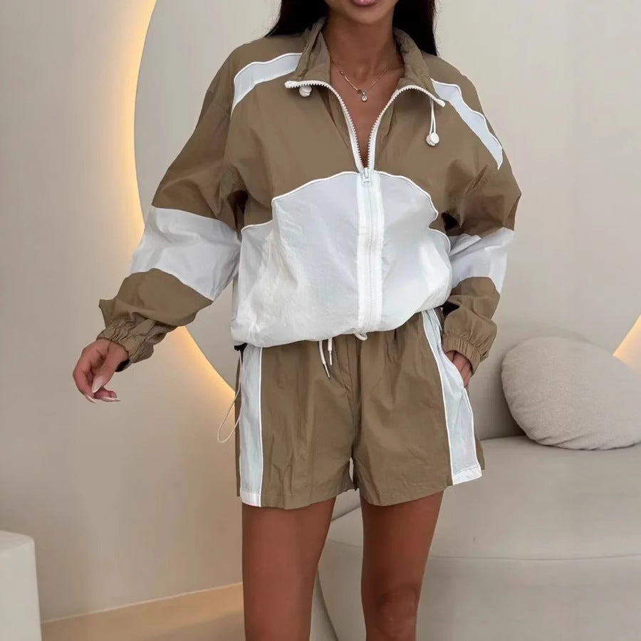 Damen sportlicher Zweiteiler mit winddichter Jacke und lässigen Shorts Stalluxe