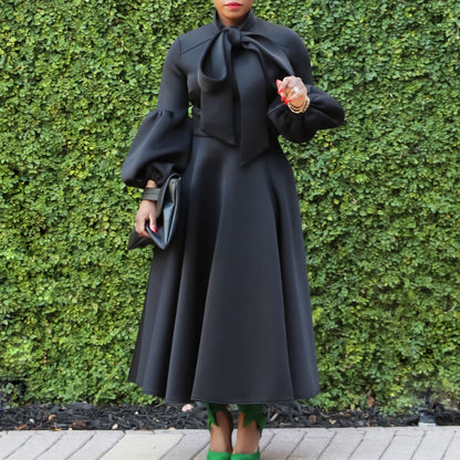 Damen Midi-Kleid mit bindbarem Kragen und voluminösen Ärmeln Stalluxe